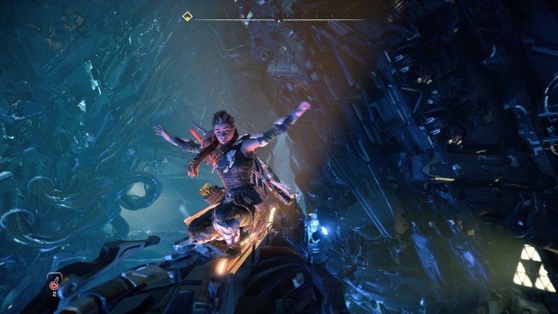 Aloy balancing on a moving robot arm inside a Cauldron, trying to keep her balance.