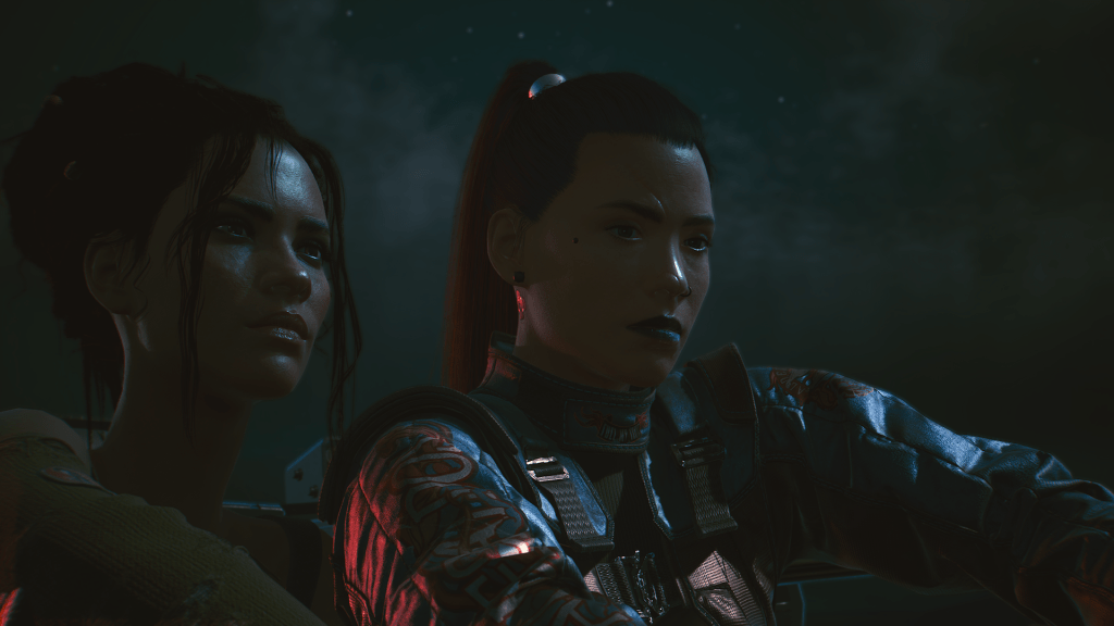 A close-up shot of Panam on the left an my V on the right during the final scenes of the epilogue. Both are looking into the distance while driving away from Night City to start a new life.