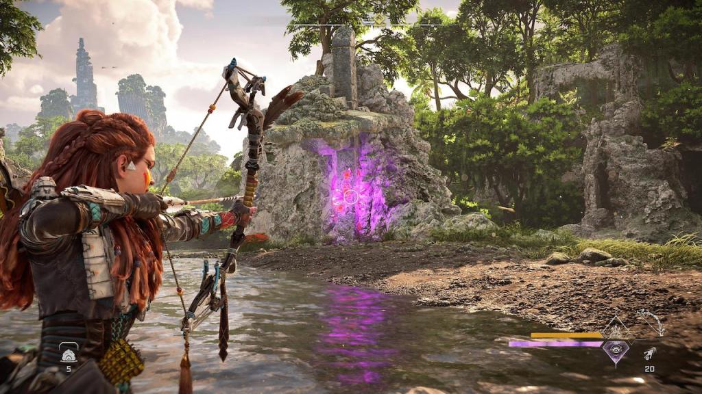 Aloy aiming her bow at a stone structure covered in unstable pink Firegleam.