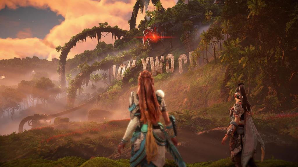 Aloy and Seyka are standing underneath the Hollywood sign witnessing how the derelict Horus is powering up.