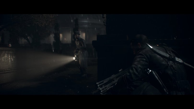 The protagonist is hiding behind a small wall in an elaborate garden to remain unseen from guards walking the area. It is the middle of the night and rain is pouring down.