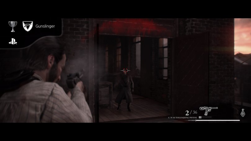 Sir Galahad shooting at an enemy in a warehouse adjacent to the one he is standing on.