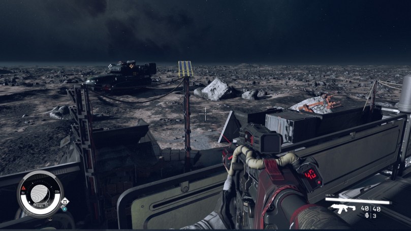 A look across a barren planet's surface from the top of a small building with a dark sky until the horizon and a spaceship standing close by.