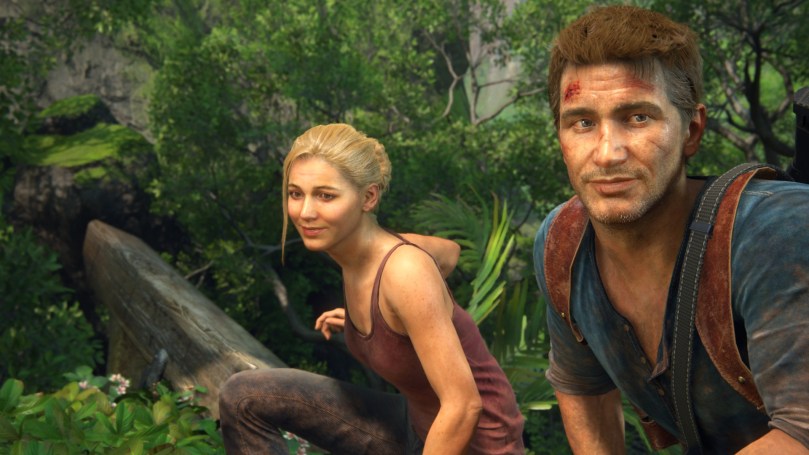 A close-up of Nathan and Elena in the forest, smiling. Both are dirty and banged-up. The images shows the high-quality rendering of characters, especially during cutscenes.