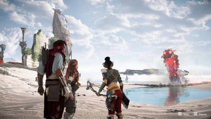 Aloy and two of her firends face down a Tideripper that is emerging from the sea.