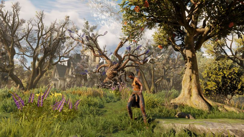 Hazel standing in the midle of an orchard full of leafless trees. An old and abandoned rich person's house can be seen in the background.